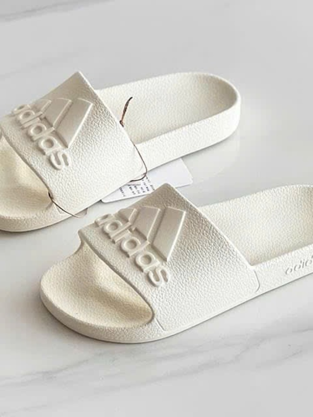 adidas White Slide Sandals with Embossed Logo